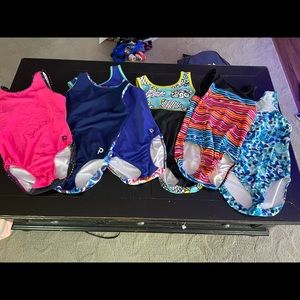 Six plum practice wear leotards